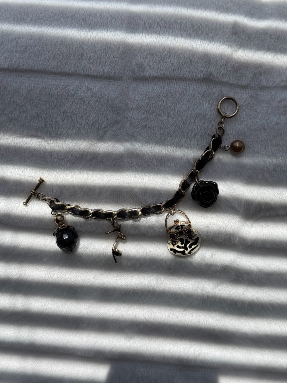 Women's Black Charm Bracelet with Floral and Orb Accents